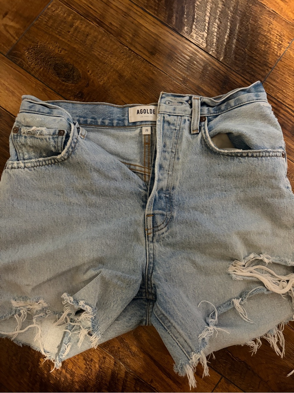 Agolde Light Blue Distressed Denim Cutoff Shorts